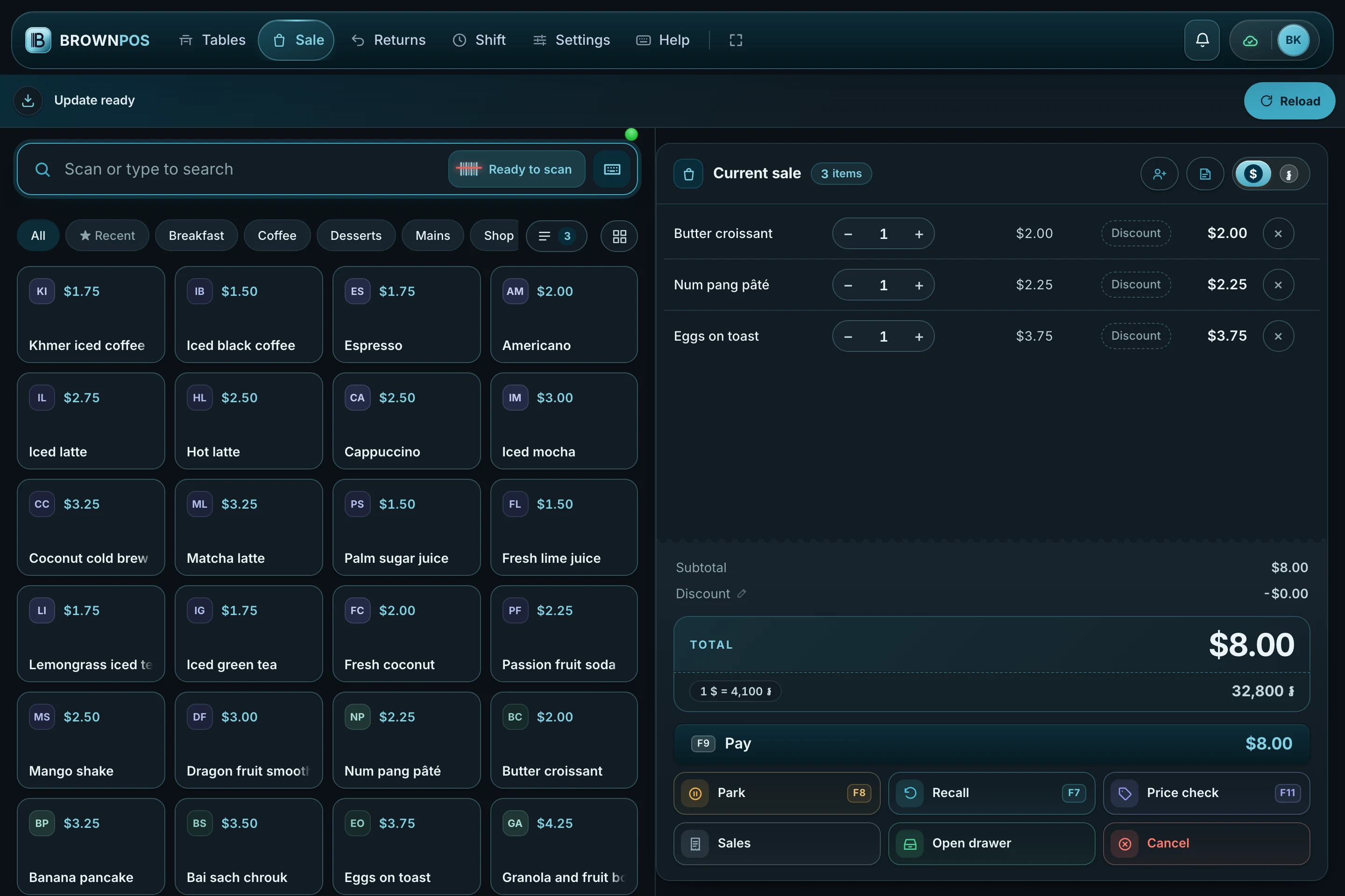 Cambodia POS System — The same till running in dark mode, the Update ready strip under the header with the Reload button standing clear of it